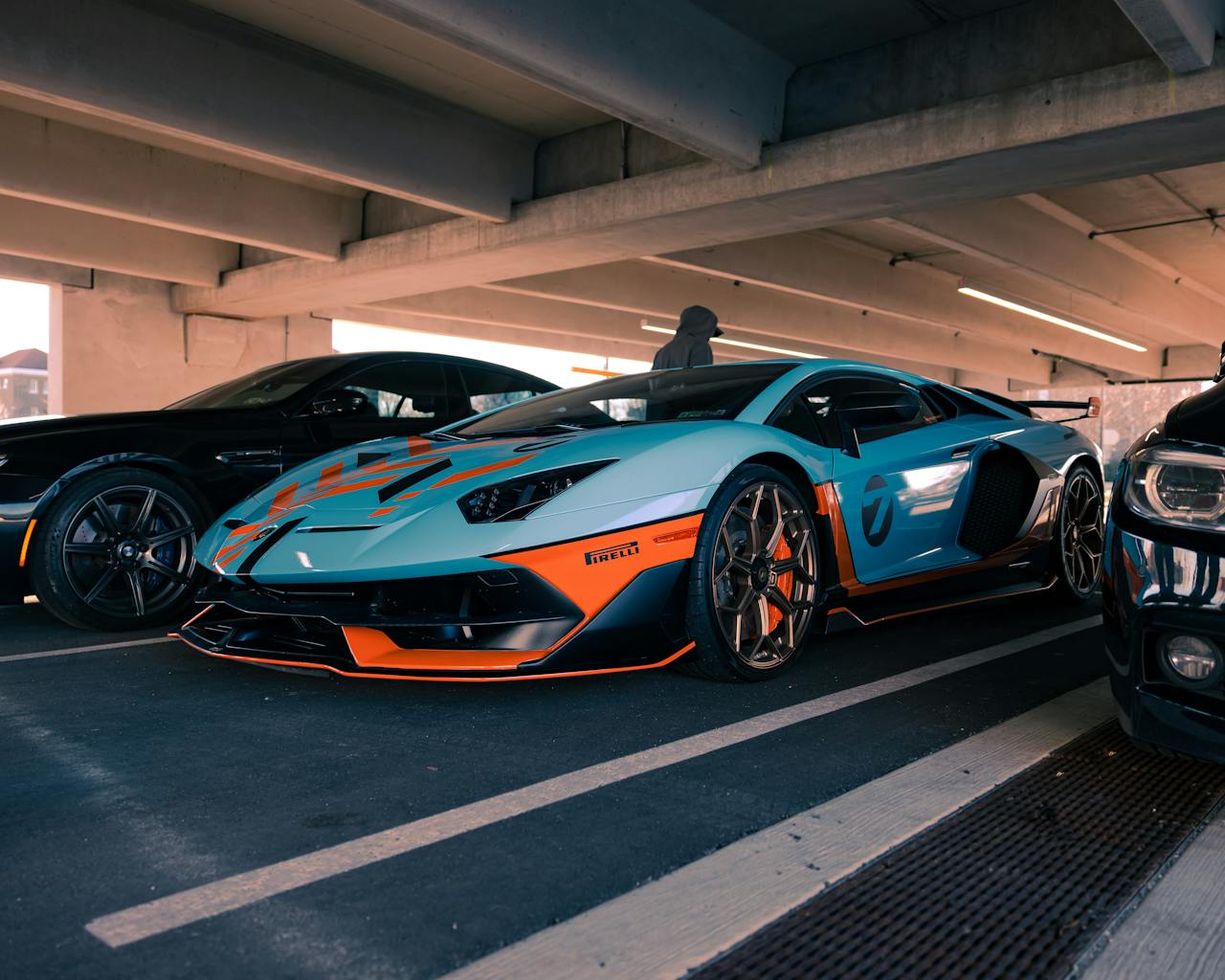 services-02 Custom blue and orange racing car parked in a Philadelphia parking garage.